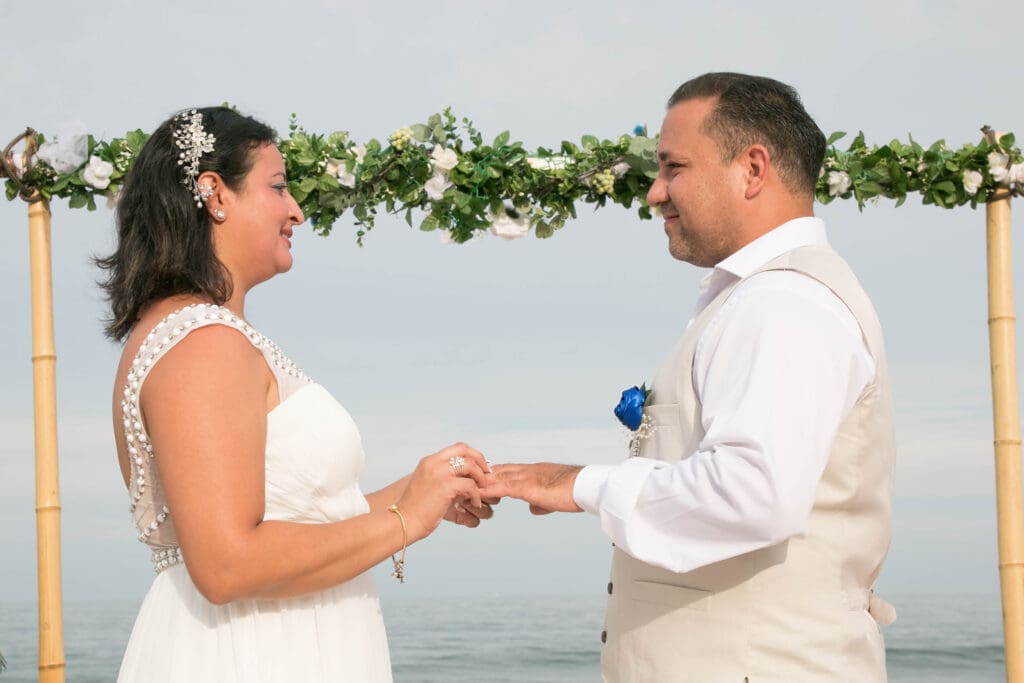 beach wedding arch ring exchange